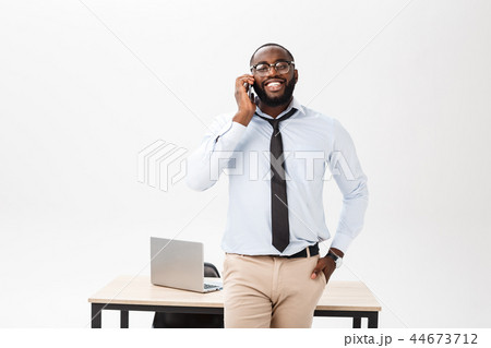 Headshot of successful smiling cheerful african american businessman executive stylish company 44673712