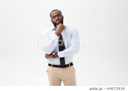 business man African American with glasses thinks on isolated white background 44673916
