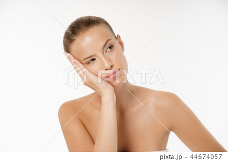 portrait of a young bored woman with no makeup , isolated over white background portrait of a young bored woman with no makeup , isolated over white background 44674057