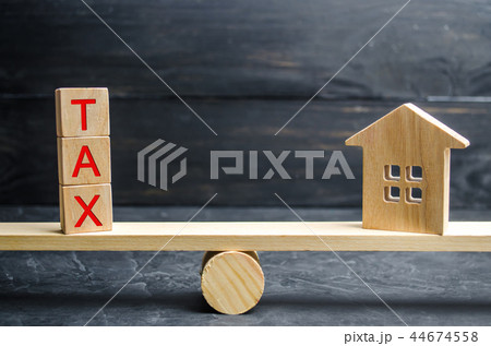 Wooden house with the inscription "Tax" 44674558