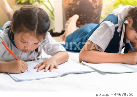 two sister girl writes to writing-books lessons 44679550