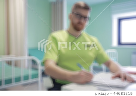 surgeon blurred background / concept medicine, background surgery, work clothes, blur modern background in medical clinic defocus surgeon blurred background / concept medicine, background surgery, work clothes, blur modern background in medical clinic defocus 44681219