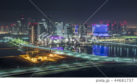 Aerial skyline of Abu Dhabi city centre from above night timelapse 44681737