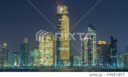 Panorama view of Abu Dhabi Skyline and seafront at night timelapse, United Arab Emirates 44681807