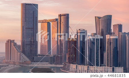 Buildings on Al Reem island in Abu Dhabi timelapse from above. 44681835
