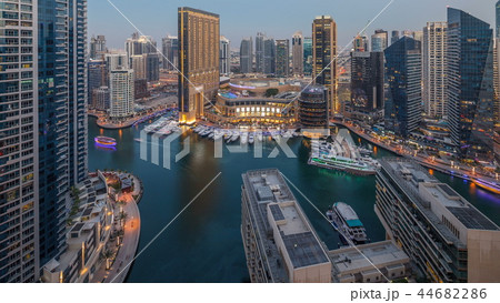 Evening illumination of Dubai Marina day to night aerial timelapse, UAE. 44682286