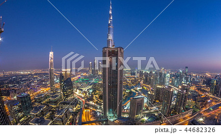 Dubai Downtown day to night timelapse modern towers panoramic view from the top in Dubai, United Arab Emirates. 44682326