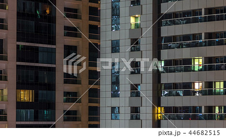 Scenic glowing windows of skyscrapers at evening timelapse Scenic glowing windows of skyscrapers at evening timelapse 44682515