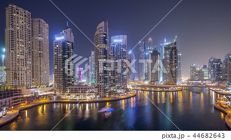 Water canal on Dubai Marina skyline at night timelapse. 44682643