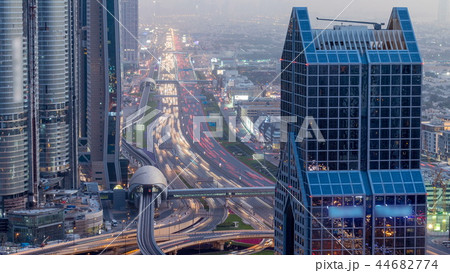 Dubai downtown skyline day to night timelapse and Sheikh Zayed road traffic, UAE Dubai downtown skyline day to night timelapse and Sheikh Zayed road traffic, UAE 44682774