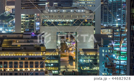 Skyline view of the buildings of Sheikh Zayed Road and DIFC night timelapse in Dubai, UAE. 44682928