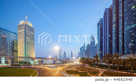 Traffic on intersection and bridge at the Sheikh Zayed Road day to night timelapse Traffic on intersection and bridge at the Sheikh Zayed Road day to night timelapse 44682940