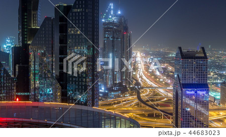 Dubai downtown skyline night timelapse and Sheikh Zayed road traffic, UAE 44683023