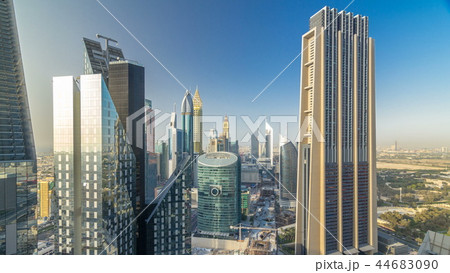 Skyline view of the buildings of Sheikh Zayed Road and DIFC timelapse in Dubai, UAE. Skyline view of the buildings of Sheikh Zayed Road and DIFC timelapse in Dubai, UAE. 44683090