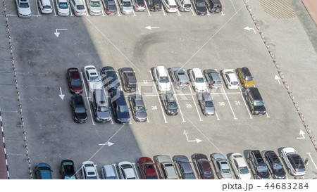 Top view of parking lot timelapse from rooftop of skyscraper 44683284