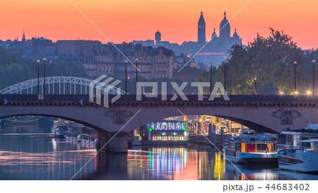 Basilica Sacre Coeur and the Seine river night to day transition timelapse before sunrise, Paris, France. 44683402