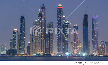 Dubai Marina skyline day to night timelapse as seen from Palm Jumeirah in Dubai, UAE. Dubai Marina skyline day to night timelapse as seen from Palm Jumeirah in Dubai, UAE. 44684062