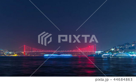 Illuminated bridge over Bosphorus night timelapse. Turkey renames Bosporus Bridge "15th July Martyrs Bridge". Istanbul Turkey. Illuminated bridge over Bosphorus night timelapse. Turkey renames Bosporus Bridge "15th July Martyrs Bridge". Istanbul Turkey. 44684863