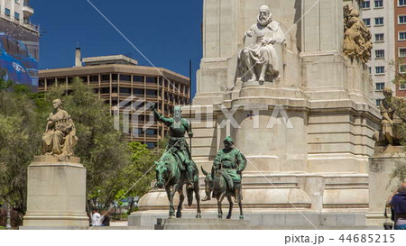 View of the stone sculpture of Miguel de Cervantes timelapse hyperlapse and bronze sculptures of Don Quixote and Sancho Panza on the Square of Spain 44685215