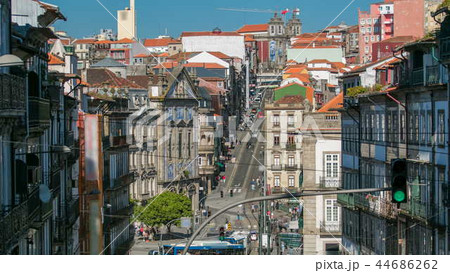 View of the Almeida Garret Square with the Sao Bento railway station and Congregados Church timelapse. 44686262