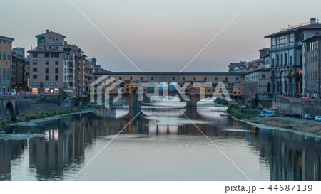 River Arno and famous bridge Ponte Vecchio day to night timelapse after sunset from Ponte alle Grazie in Florence, Tuscany, Italy 44687139