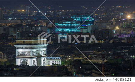 Aerial Night timelapse view of Paris City and Triumphal Arch shot on the top of Eiffel Tower Aerial Night timelapse view of Paris City and Triumphal Arch shot on the top of Eiffel Tower 44688121