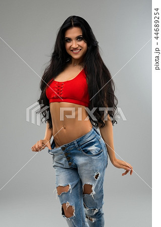 Gorgeous happy brunette full-length view 44689254