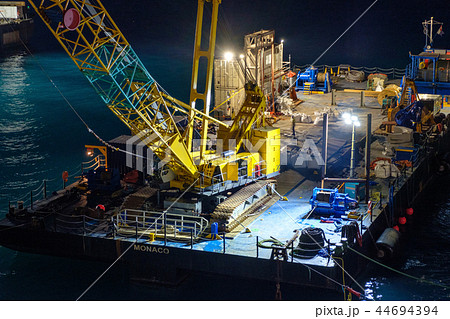 Crane vessels on water at night Crane vessels on water at night 44694394