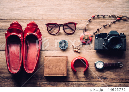clothing for women, placed on a wooden floor. clothing for women, placed on a wooden floor. 44695772