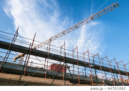 Lifting crane and building in construction site 44701892