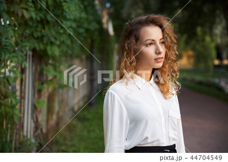 Photo of a serious woman in the Park Photo of a serious woman in the Park 44704549