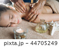 Body care. Spa body massage treatment. Woman having massage in the spa salon. 44705249