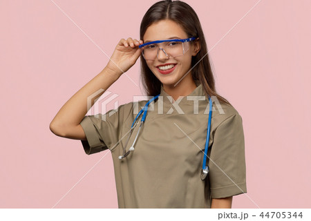 A stylish doctor with long dark hair 44705344
