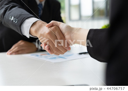 Businessmans handshake after good deal. 44706757