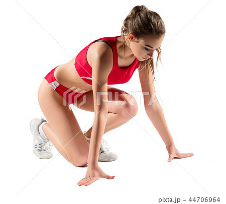 Young girl athlete isolated 44706964