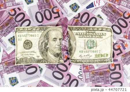 torn dollars on euro money torn dollars on euro money 44707721