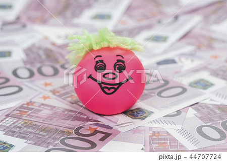 ball smiley face on the money 44707724