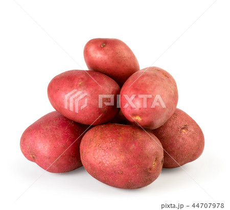 Bunch of red potatoes close up on a white Bunch of red potatoes close up on a white 44707978
