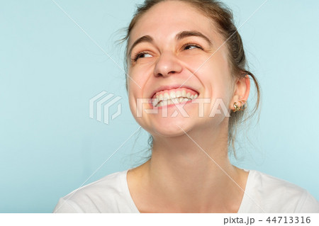 emotion face happy joy thrilled girl beaming smile 44713316