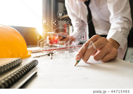 colleagues discussing data working colleagues discussing data working 44715493