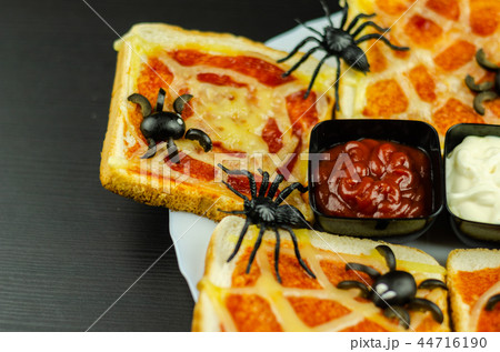 Funny sandwiches with  spider and  spider web 44716190