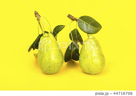 Sweet ripe fruit on bright paper background Sweet ripe fruit on bright paper background 44716706