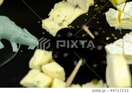 A set of cheeses served in a special form 44717213