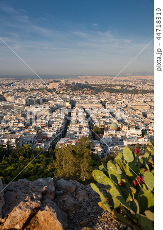 woman with a map sitting on Lycabettus Hill woman with a map sitting on Lycabettus Hill 44718319