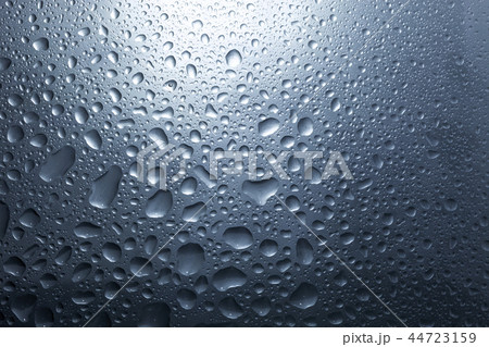 Water drops on dark wall and light Water drops on dark wall and light 44723159