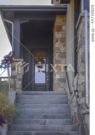 Stairs leading to doorway entry 44730826