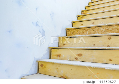 Stairs inside of house under construction Stairs inside of house under construction 44730827