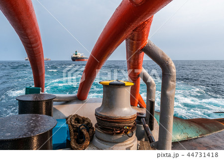 mooring equipment of ship. View from ahts vessel deck mooring equipment of ship. View from ahts vessel deck 44731418