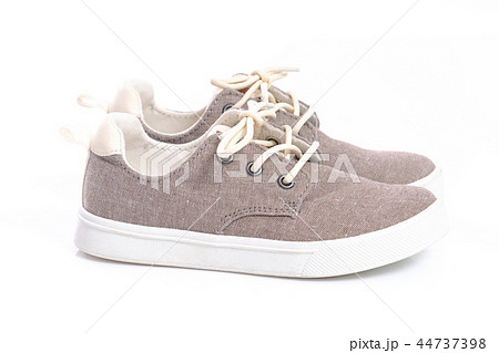 Close up of kids sneakers on white background Close up of kids sneakers on white background 44737398