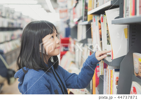 Asian girl in a bookstore 44737871